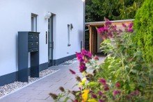 Eingang b Moderne 3-Zimmer-Gartenwohnung in Obermenzing mit Hobbyraum